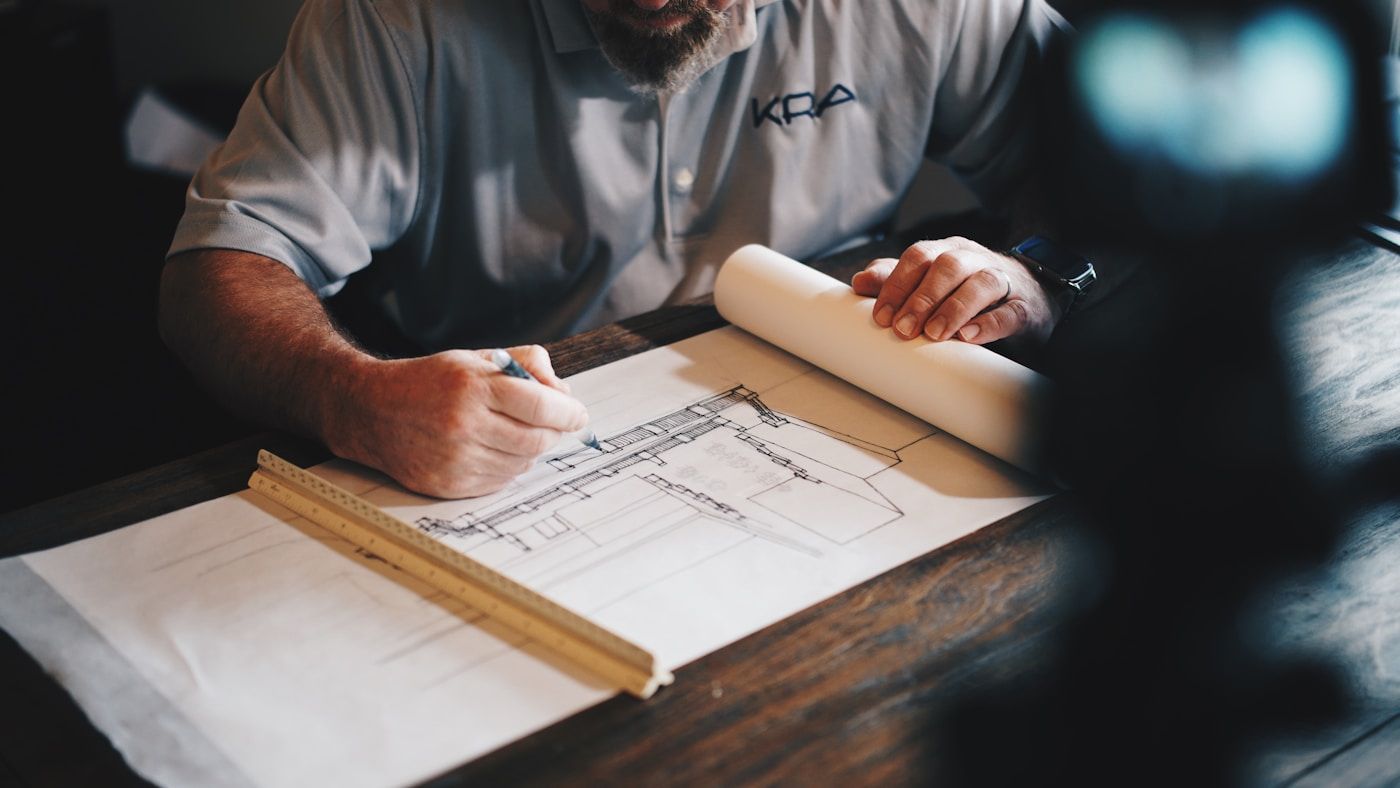 A trades operator at work — hands on the tools.